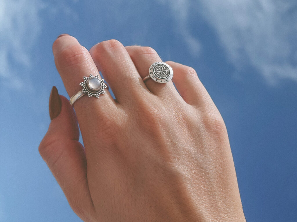 Woman Wearing Different Types Of Silver Rings
